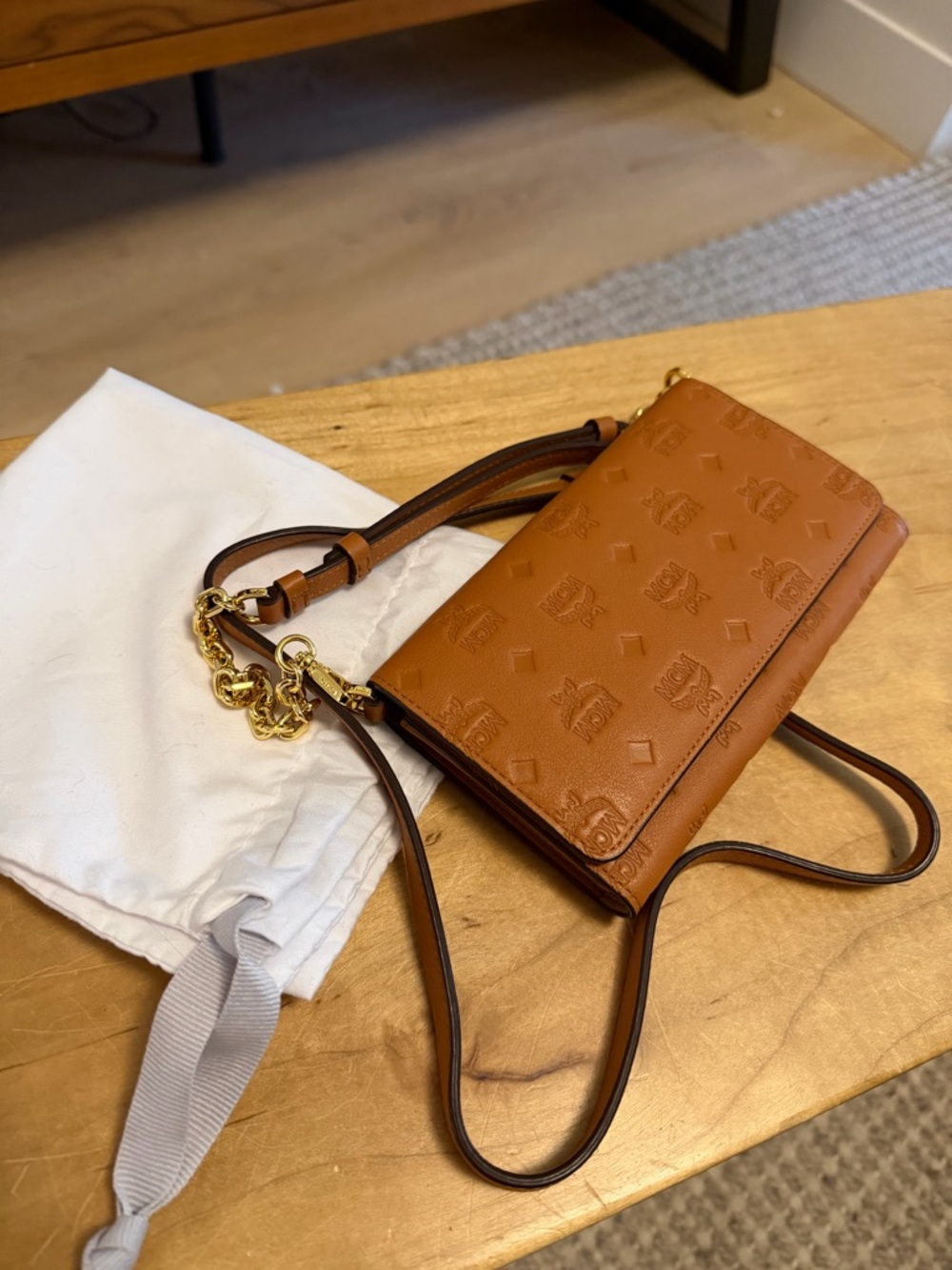 MCM Klara Logo Embossed Monogram Leather Wallet on a chain in Cognac Brown